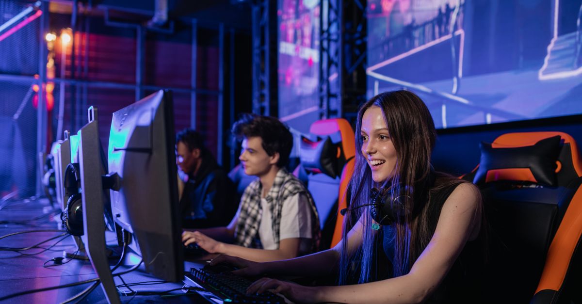 Esports player with heart rate monitor and sweat on forehead during a tournament