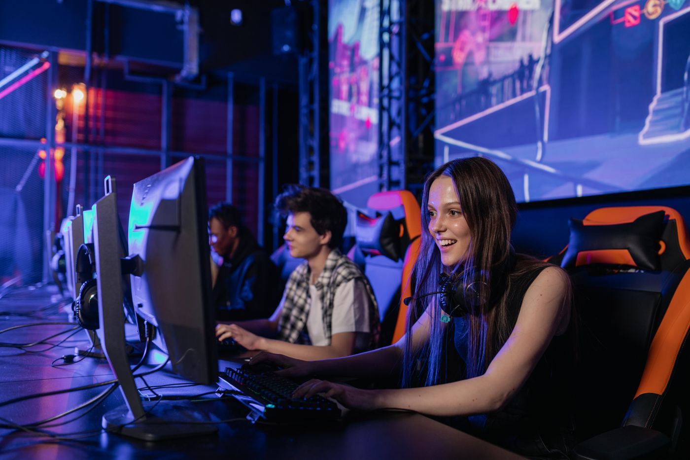Maya Rao smiling at her gaming station during a session