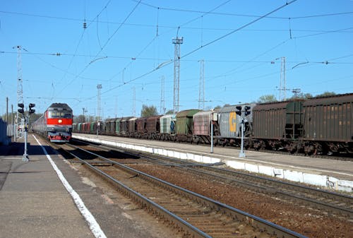 Red and Black Train on Rail Tracks