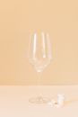 Clear Wine Glass on Brown Table