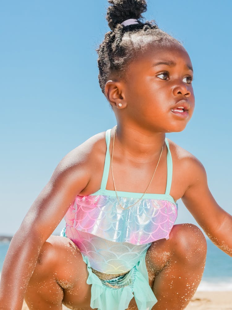 A Young Girl Wearing Swimsuit