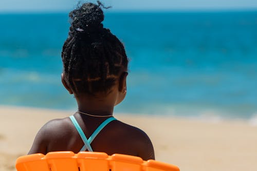 Back View of Little Girl on Beach