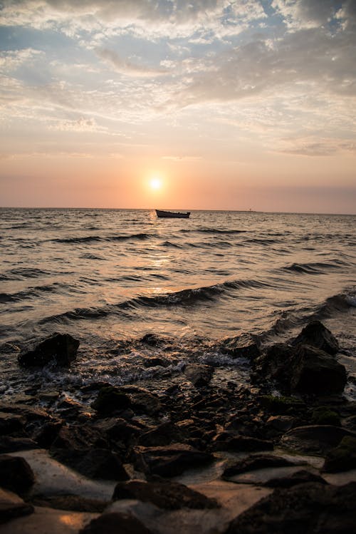 Free stock photo of atlantic ocean, beach sunset, boat