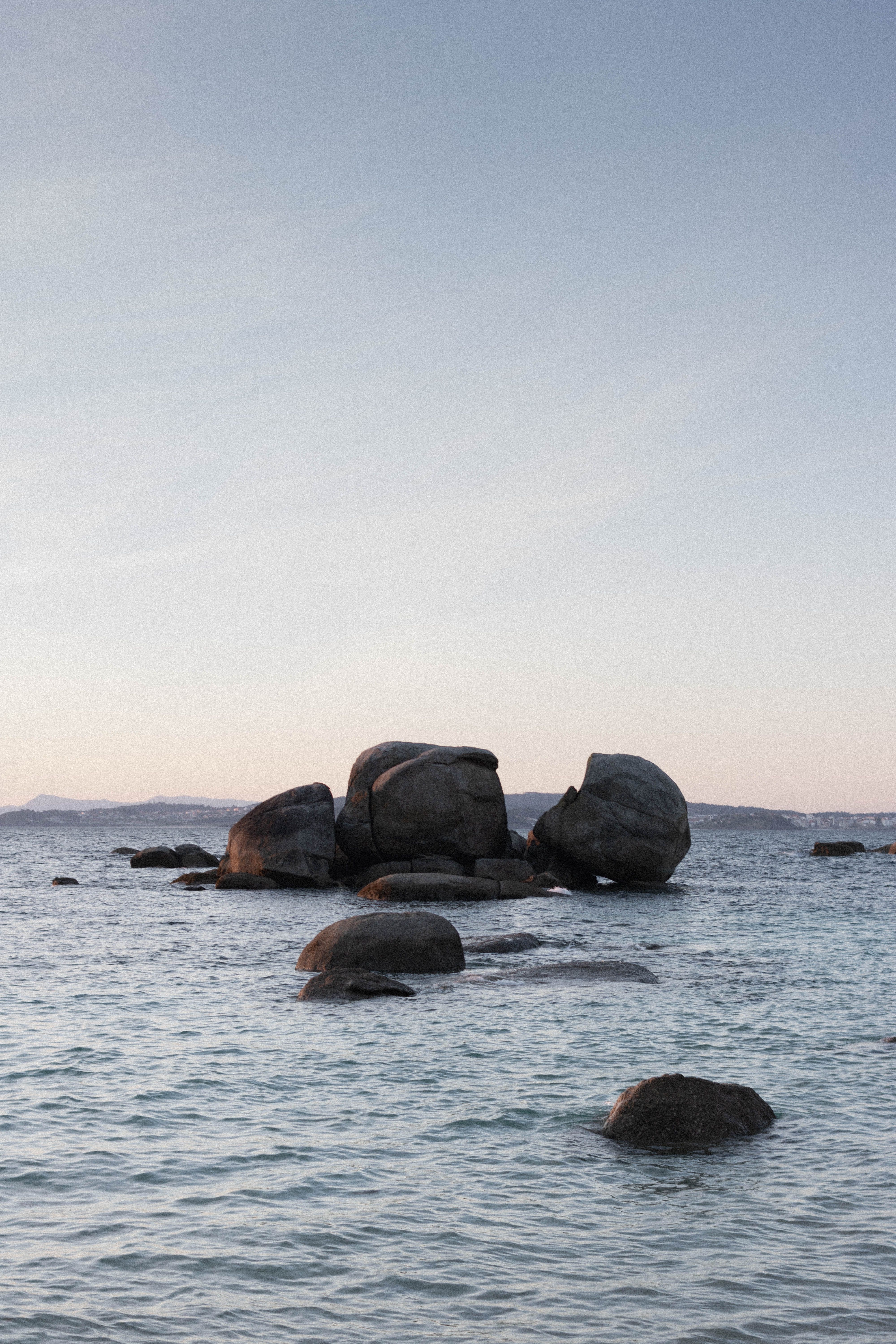 Grey Rocks in the Ocean · Free Stock Photo