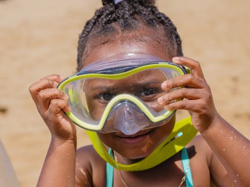 Little Girl Wearing Yellow Goggles