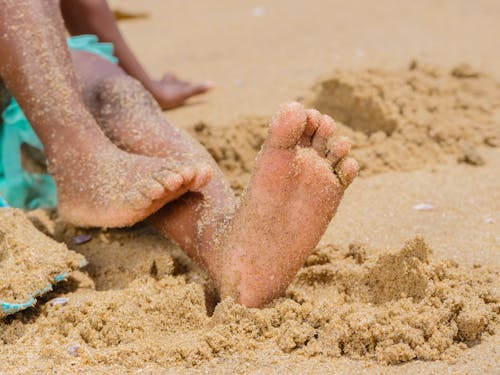 Free Barefoot on Beach Sand Stock Photo