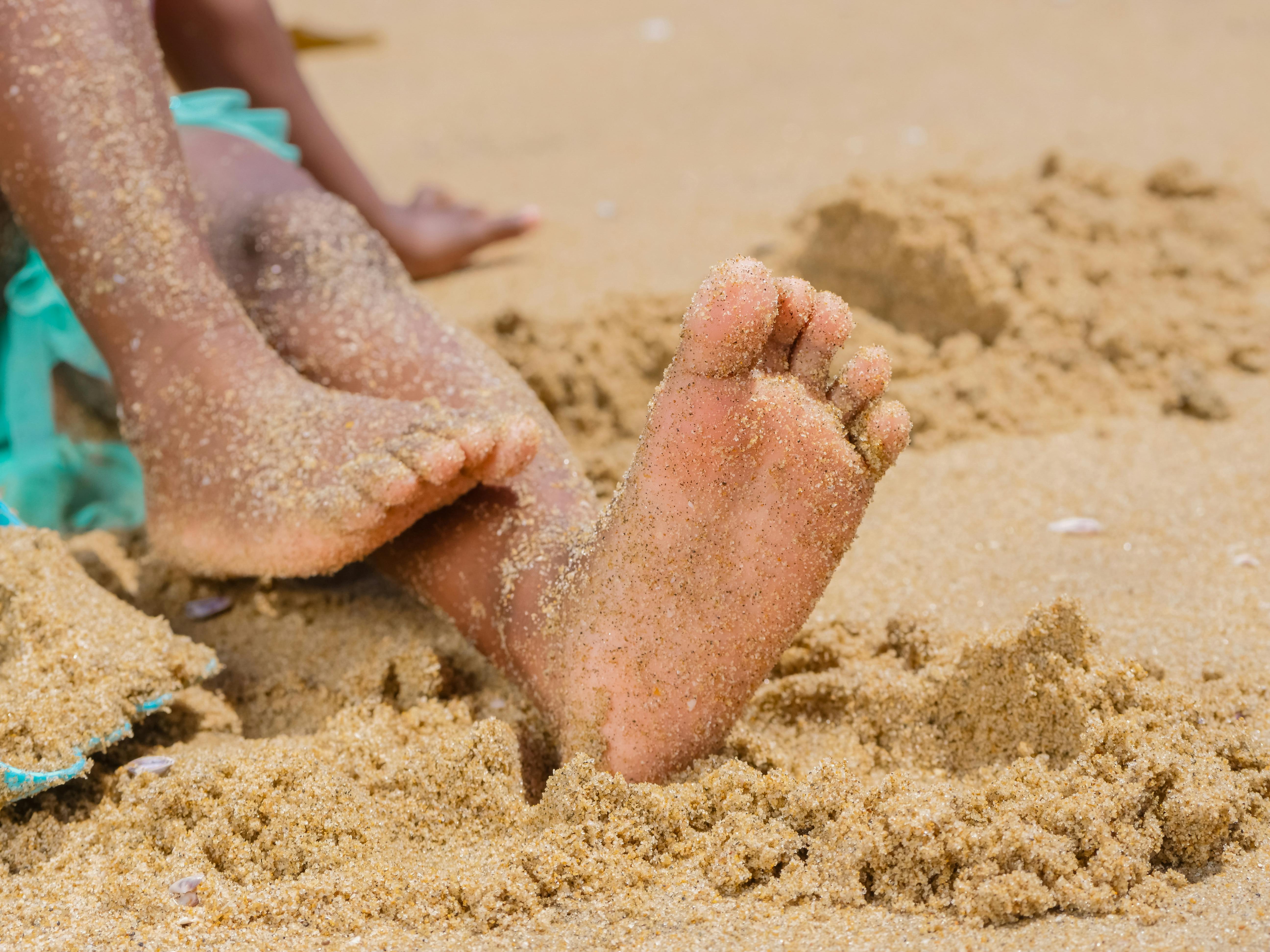 Stones on Woman's Feet · Free Stock Photo