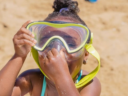 Photograph of a Child Wearing Goggles