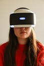 Woman in Red Sweater Using a Vr Headset