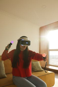 Young woman immersed in a virtual reality gaming session at home using VR headset and controllers.