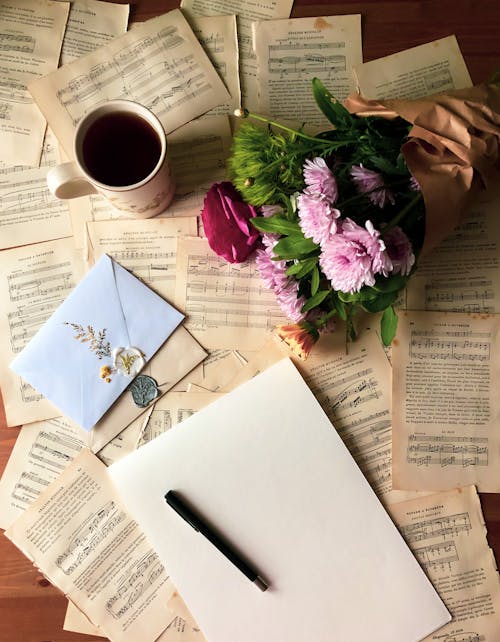 Flowers and papers on table