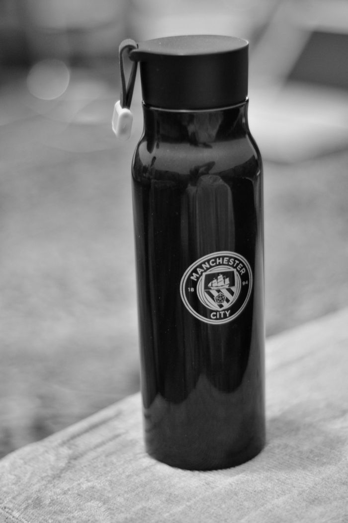 Branded water bottle on a table