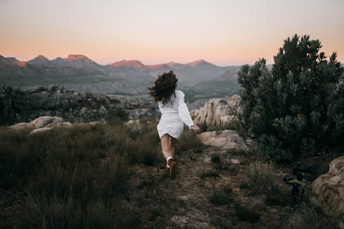 Free Woman in White Clothing Running Stock Photo