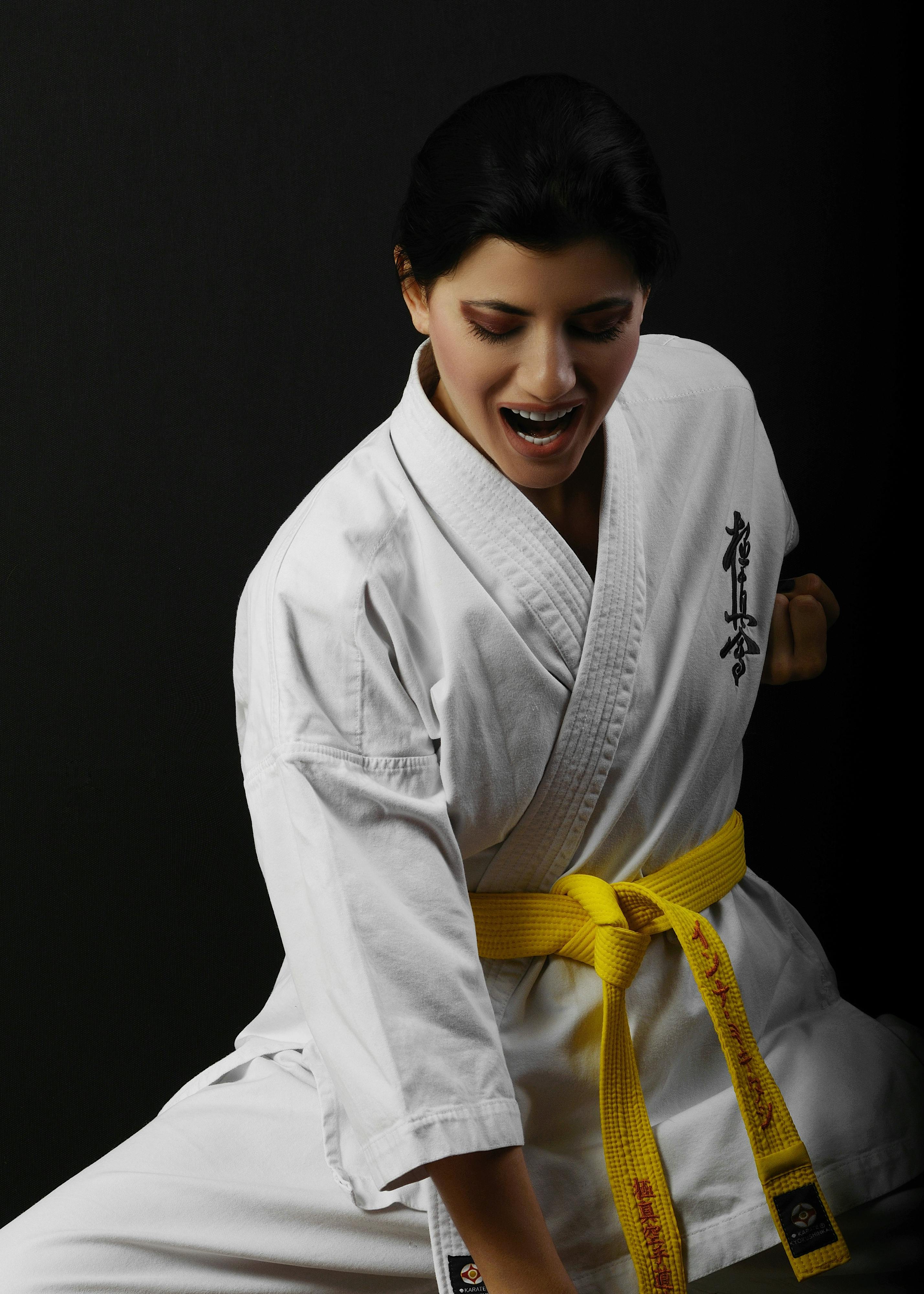 A Girl in White Taekwondo Uniform · Free Stock Photo