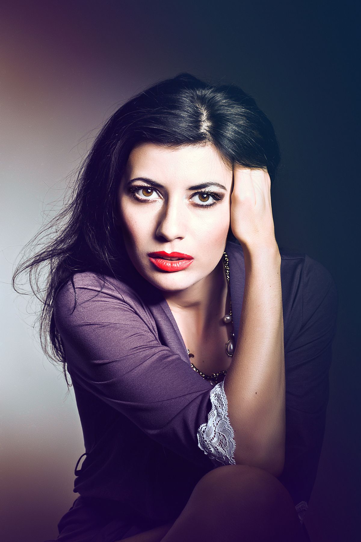 Editorial beauty portrait of a woman with red lips
