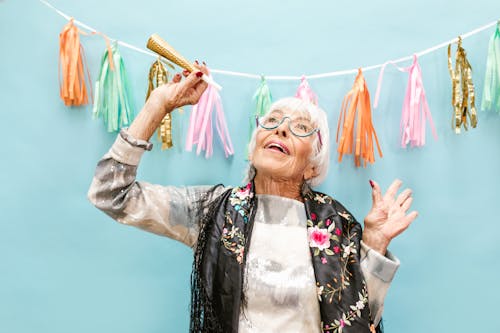 A Happy Elderly Woman Celebrating Her Birthday