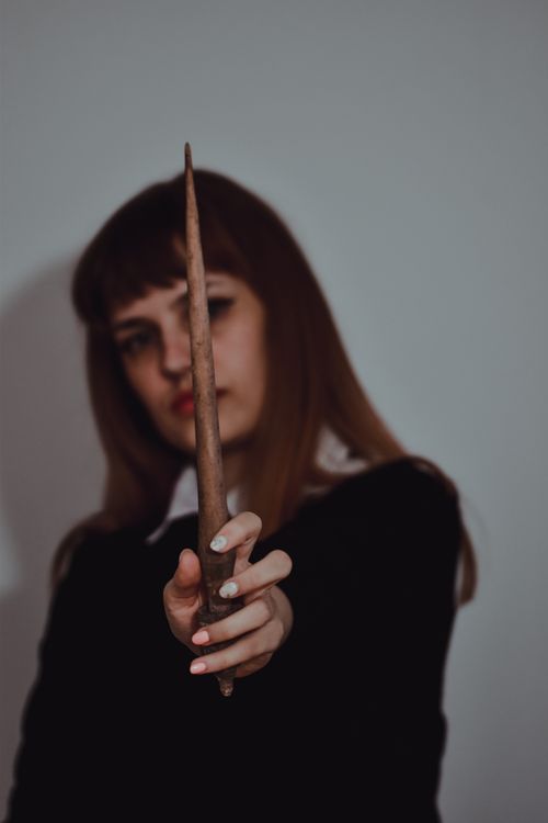 Pointedd Objects Woman Holding a Pointed Object · Free Stock Photo