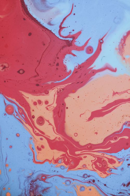 Free Dynamic abstract painting with flowing red, blue, and peach swirls. Stock Photo