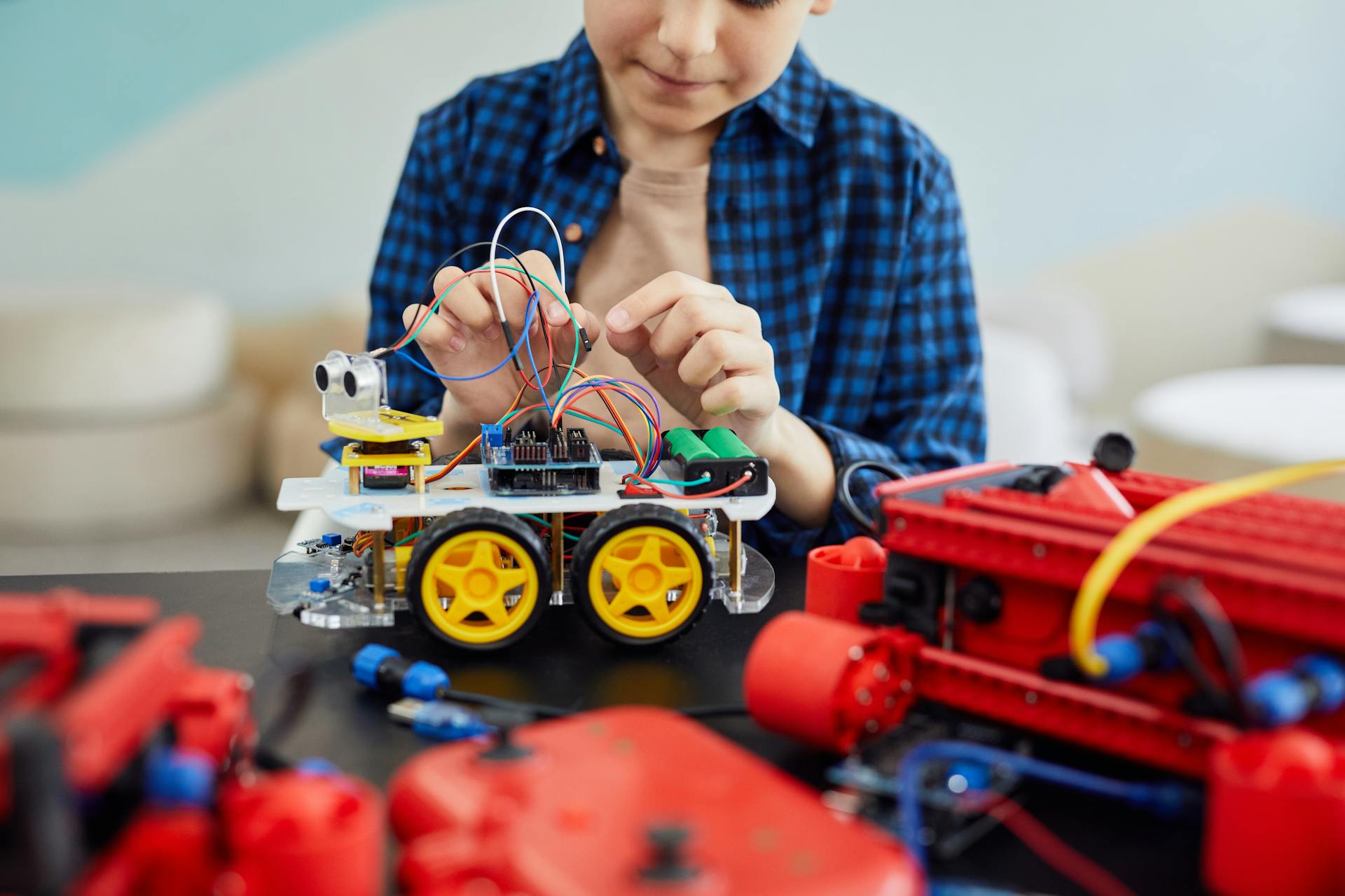 A Girl Holding White Cable Wire