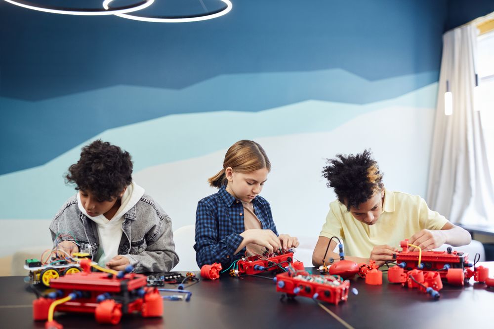 Students collaborating on a robotics science project