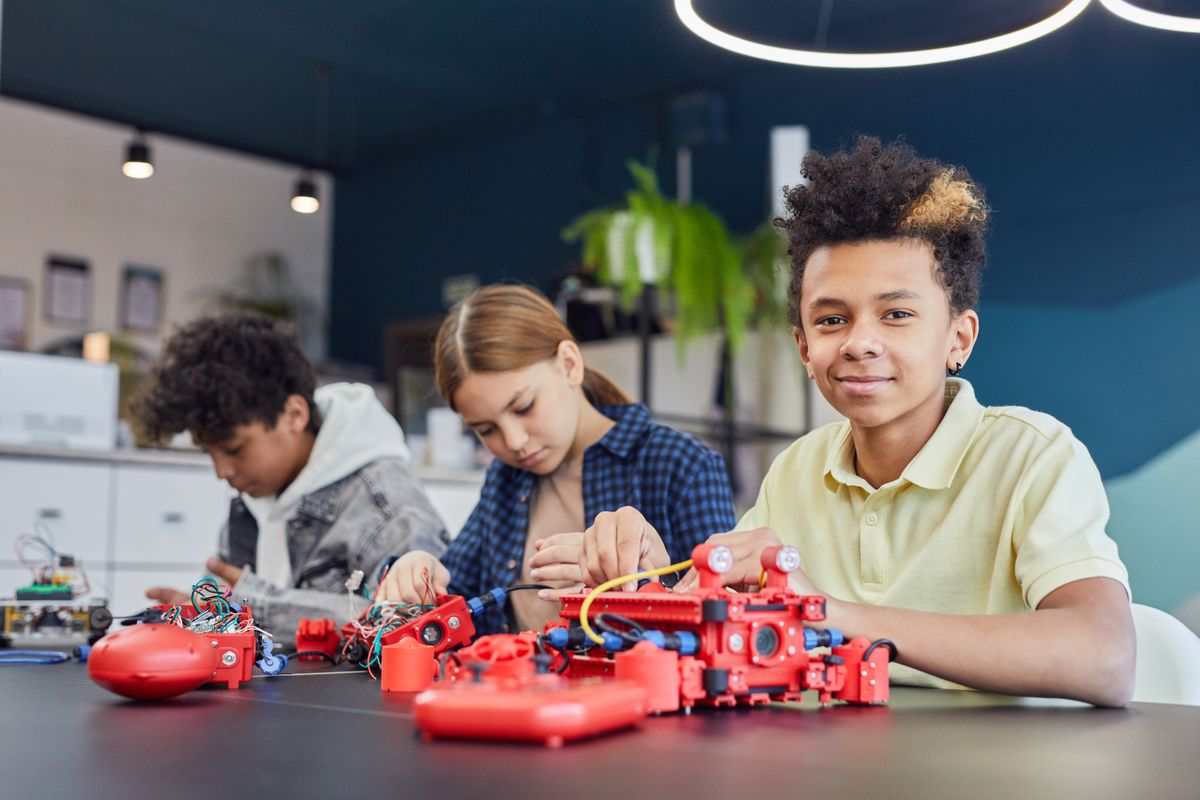 Children collaborating on a hands-on educational robotics project