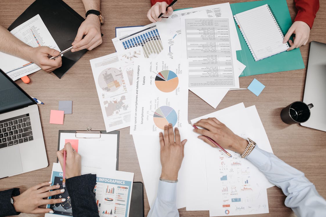 Team at a white-label digital marketing agency evaluating charts for rankings