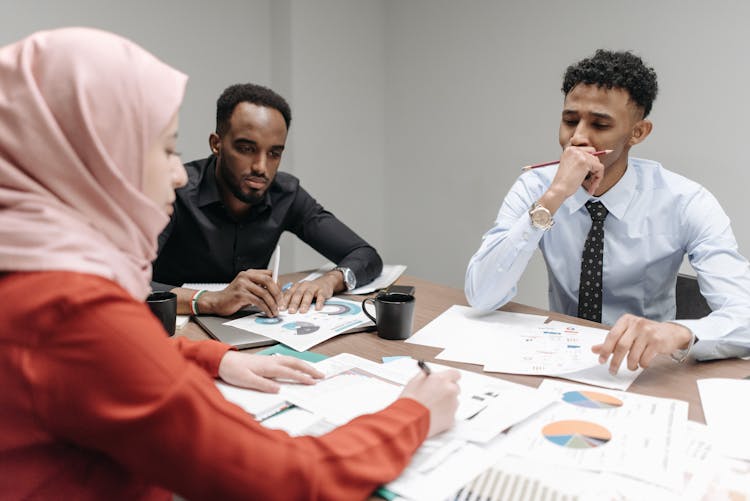 Employees Brainstorming Inside The Meeting Room