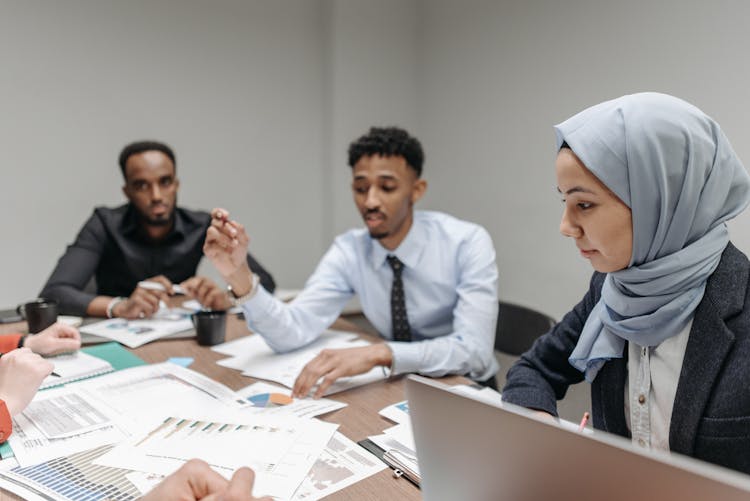 Men And Woman Having A Meeting At Work