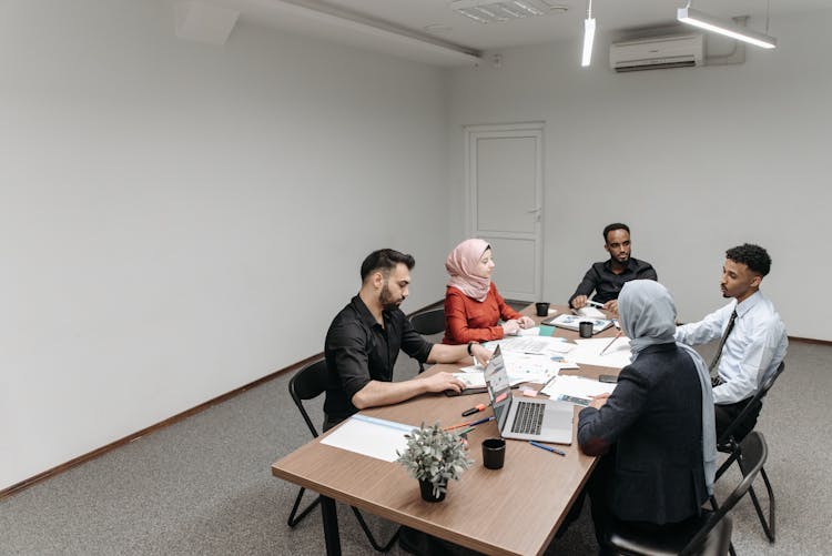 Multiracial Group Of People Having A Meeting