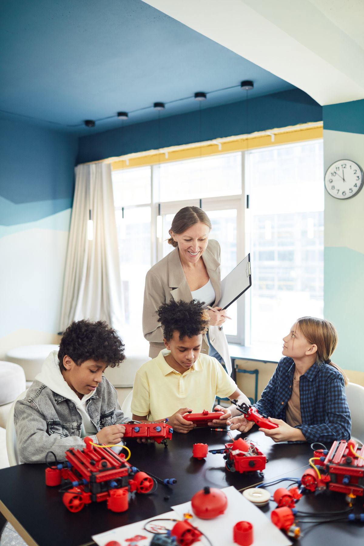 Children working together on hands-on robotics and engineering projects