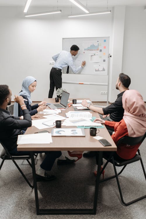 Employees Listening to the Man Speaking