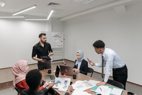 Group of People Discussing in a Conference Room