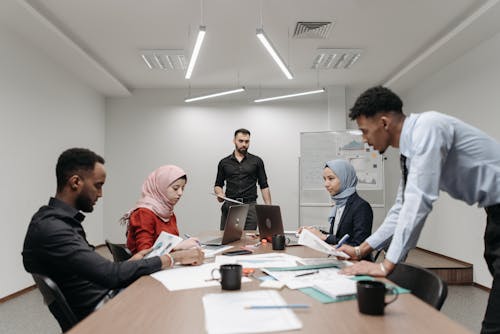 Group of Employees Brainstorming in a Conference Room