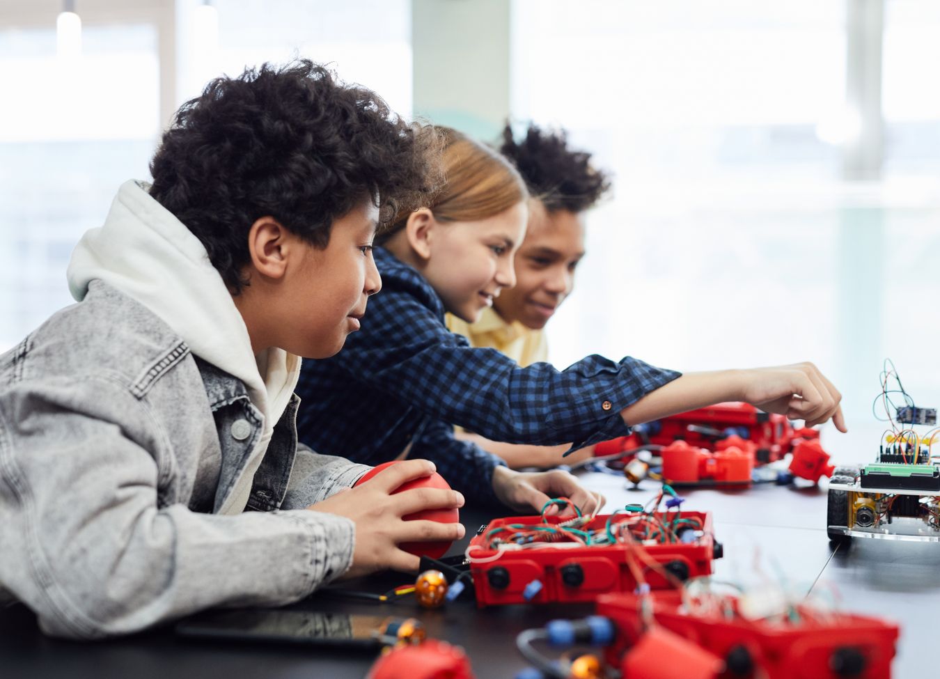 Students and educators collaborating at a STEM event