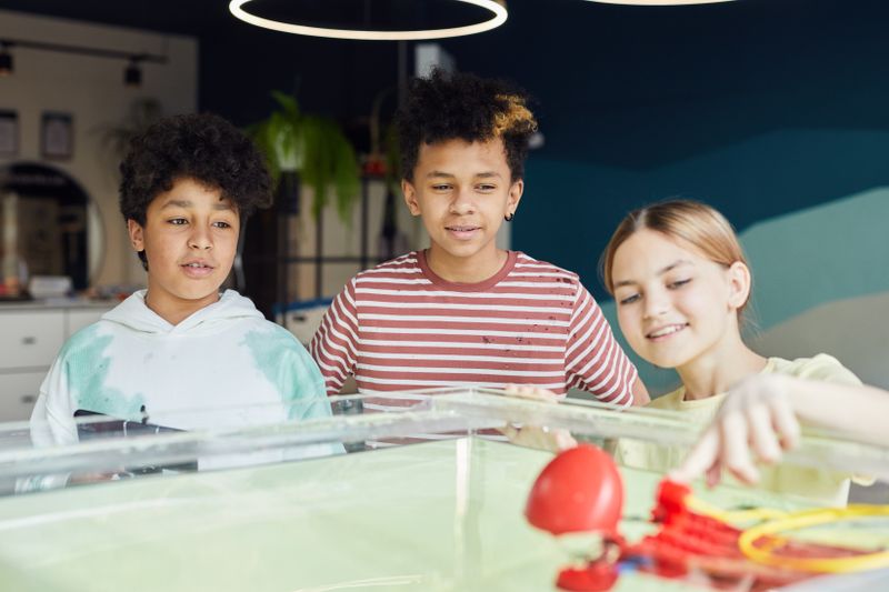 Group of smiling children at a workshop