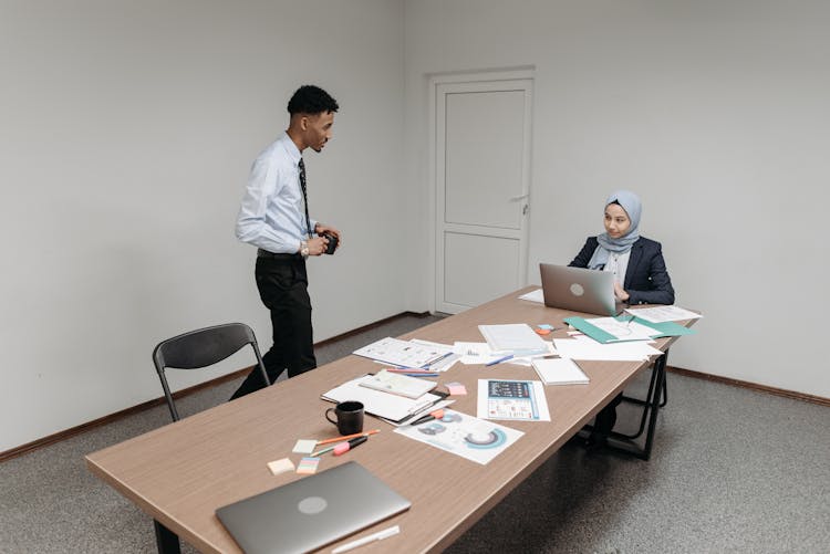 Employees Discussing Inside The Meeting Room