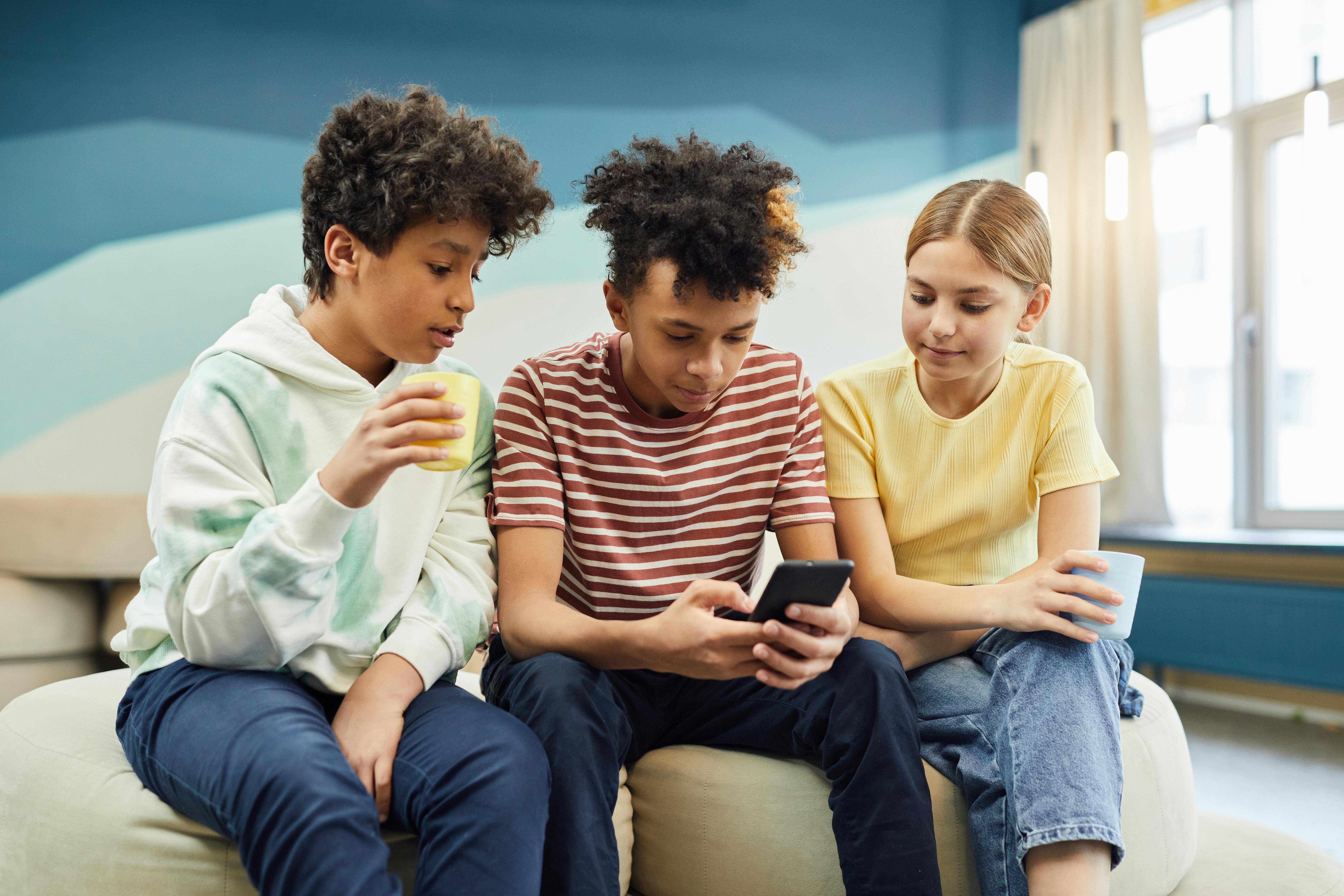 Multiethnic group of people playing online video games on tv