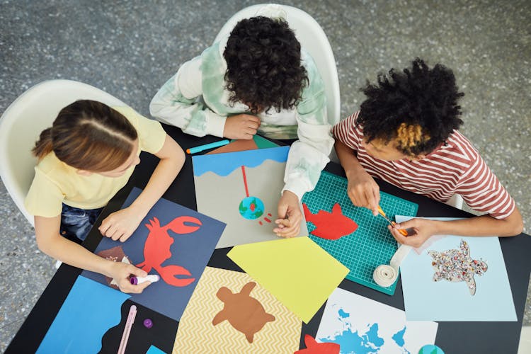 Group Of Diverse Kids Making Drawings