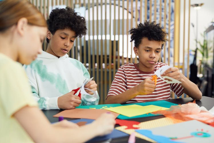 Group Of Diverse Friends Making Crafts