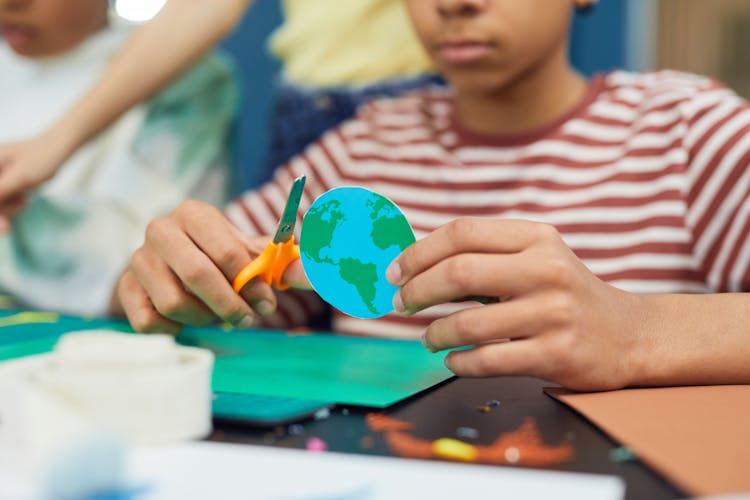 Crop Boy Making Paper Craft