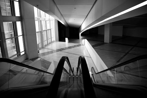 Grayscale Photo of a Hallway