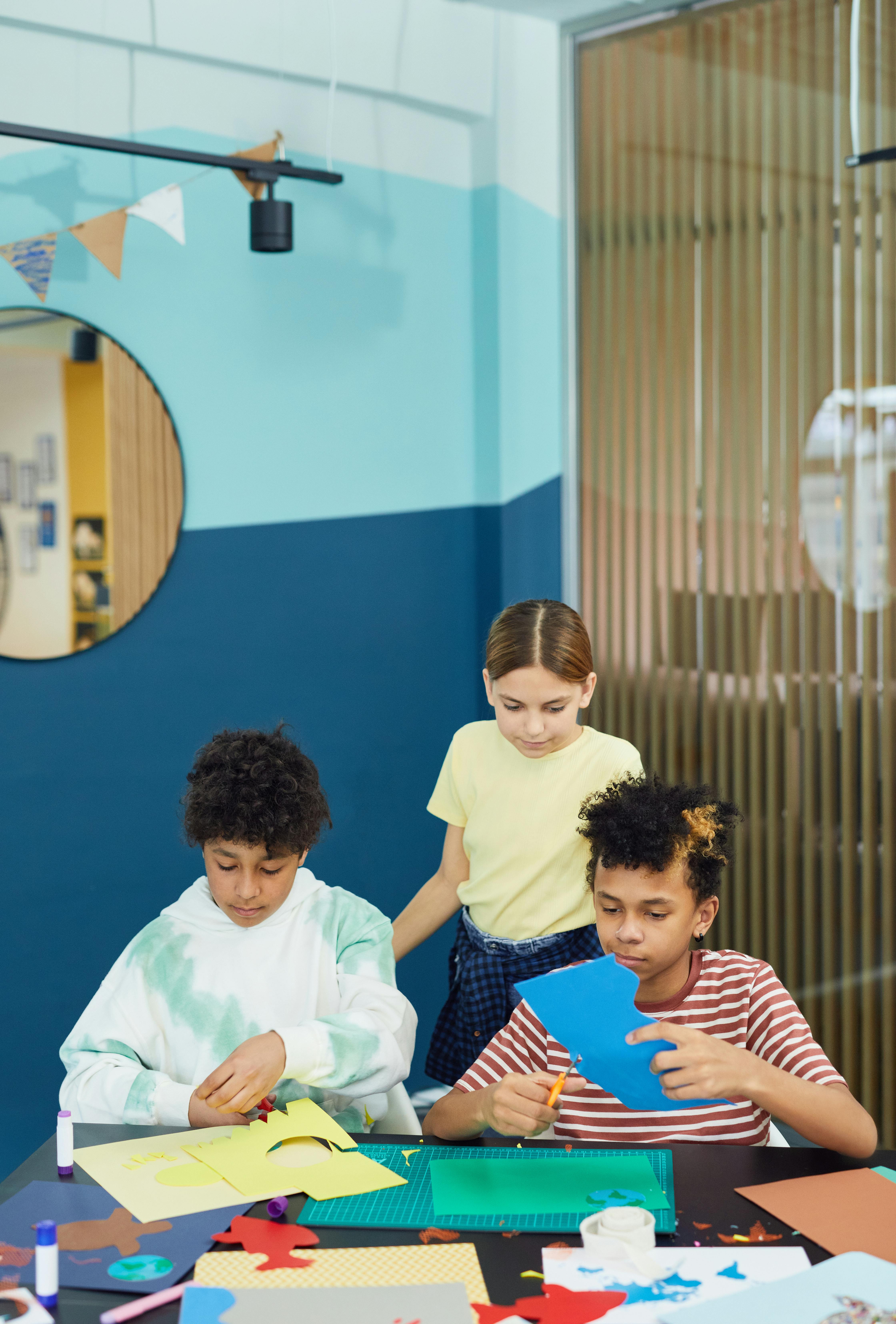 a children cutting the papers