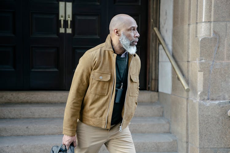 Businessman With Beard Exiting Building