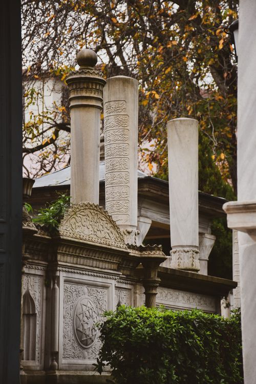 Free A close-up of intricately carved tombstones in a historic cemetery in İstanbul, Türkiye. Stock Photo