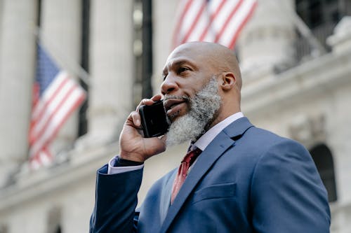 Free Good Looking Man Talking on the Phone Stock Photo