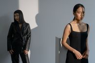 Women in Black Clothes on White Background