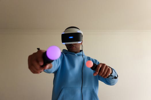 A man wearing VR headset and holding controllers immerses in gaming indoors. Perfect for tech content.