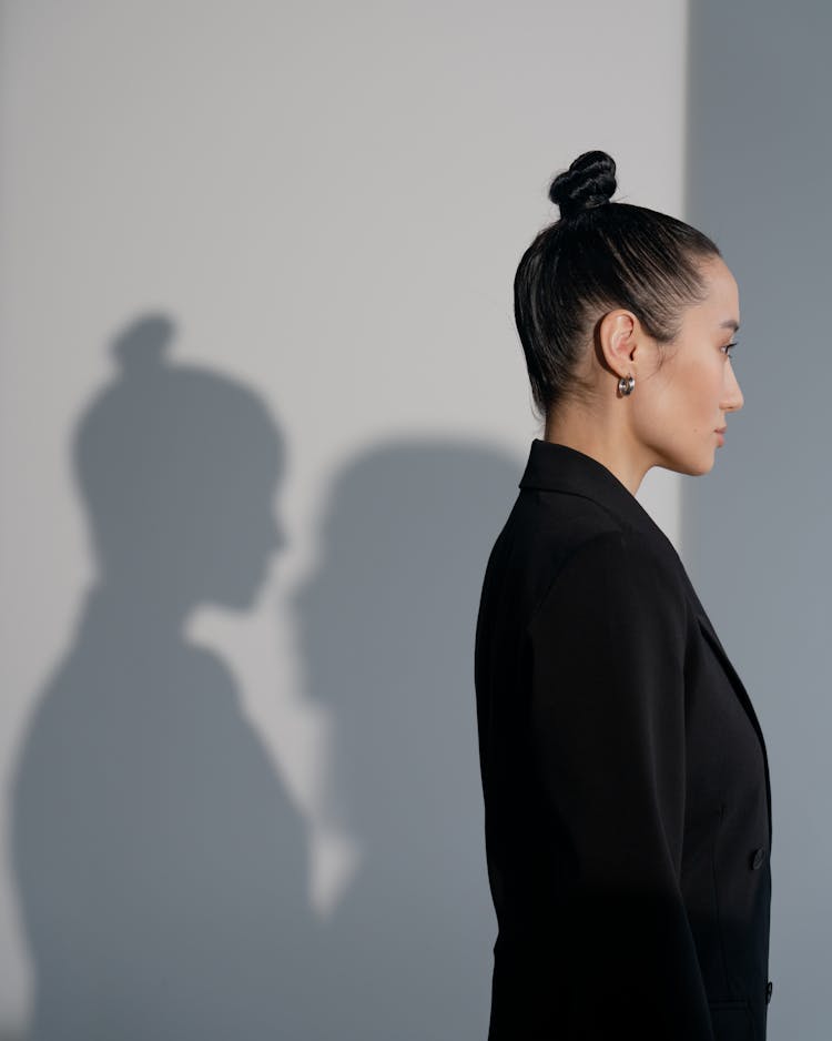 Side View Of A Woman With Ponytail