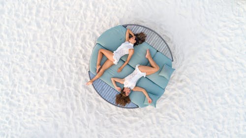 Free Two women relaxing on deckchair Stock Photo