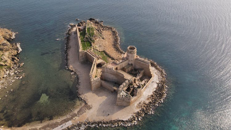 A Scenic View Of The Aragonese Castle Of Le Castella